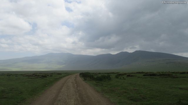  mount Lolmalasin of Ngorongoro conservation area, (left half) with Losirua (right half) as seen from the road to Empakaai